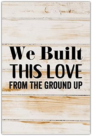 ציטוט שלט עץ בנינו את האהבה הזו מהקרקע של קיר עץ וינטג