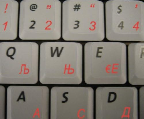 מקדונית מקלדת תוויות פריסה עם אדום אותיות שקוף רקע לשולחן עבודה, מחשב נייד ומחברת