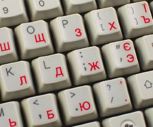 אוקראיני רוסית קירילית מקלדת מדבקה עם אדום אותיות על שקוף רקע לשולחן עבודה, מחשב נייד ומחברת